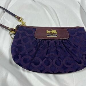 Coach Purple Clutch with Gold Hardware and Textured Design